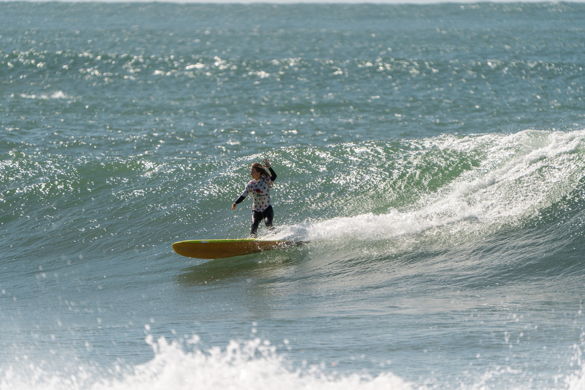 A woman surfing 