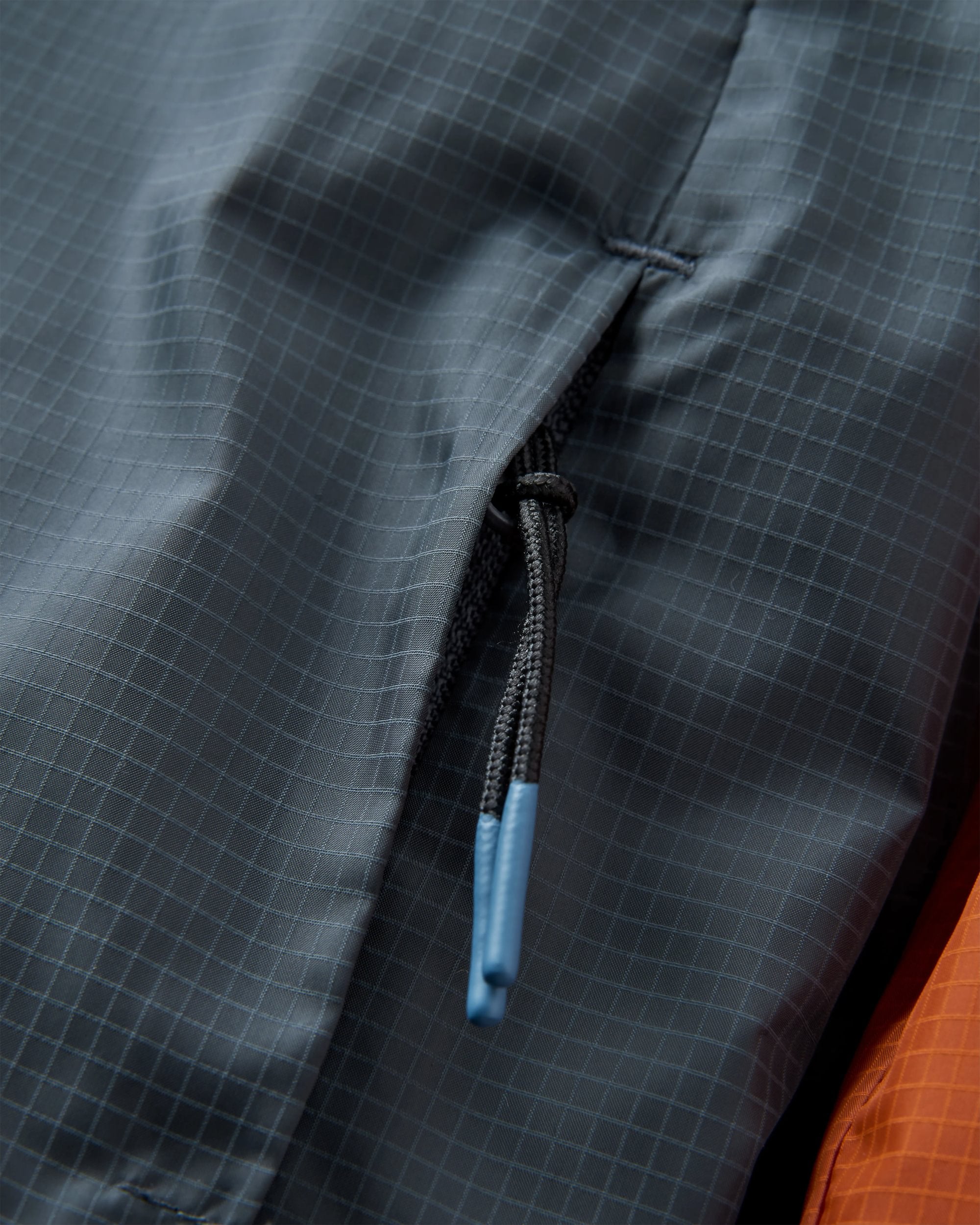 Gusto Recycled Windshell Jacket - Sunset Orange/Charcoal - Flatlay