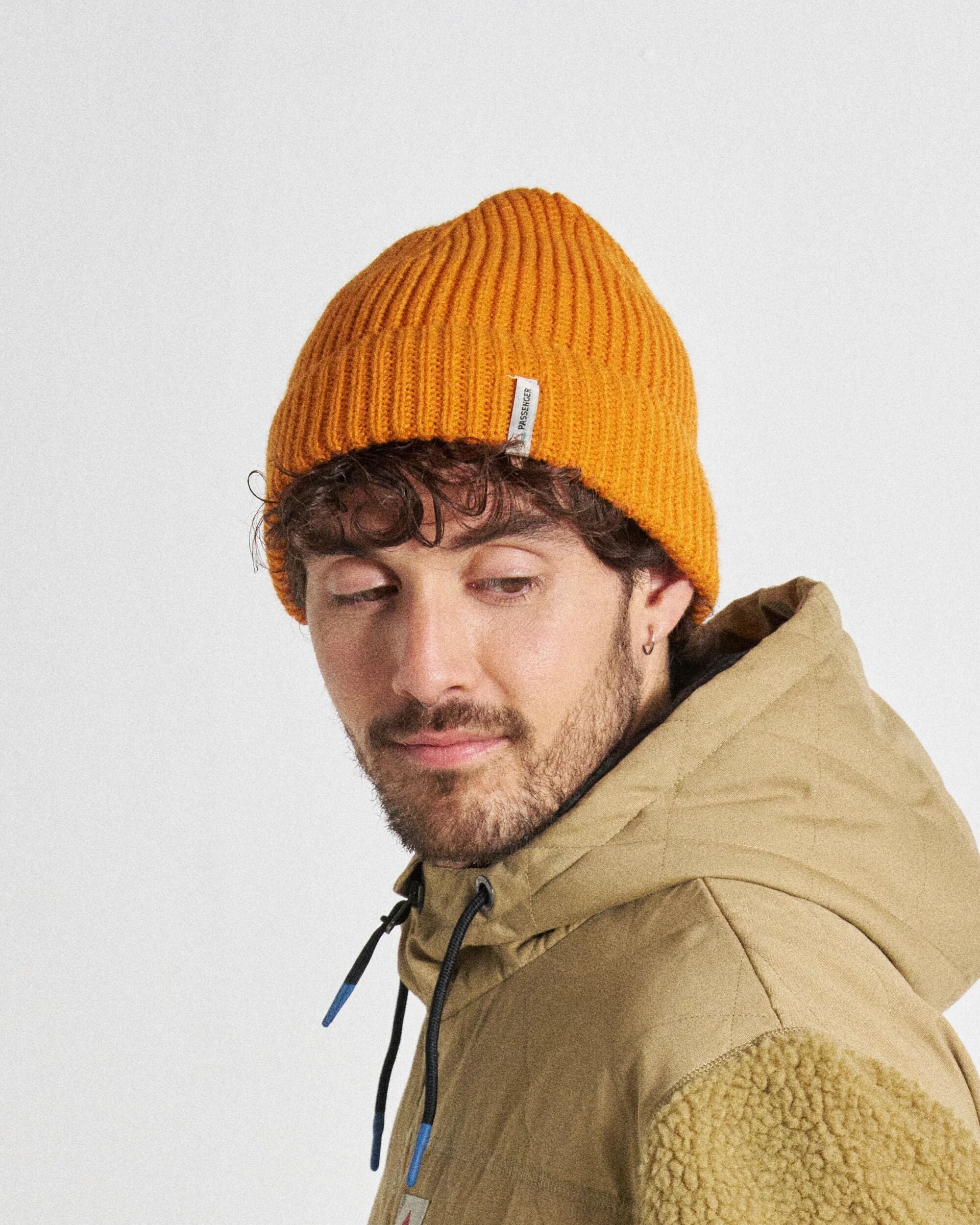 Compass Recycled Beanie - Sunrise Orange - Studio Model - Male