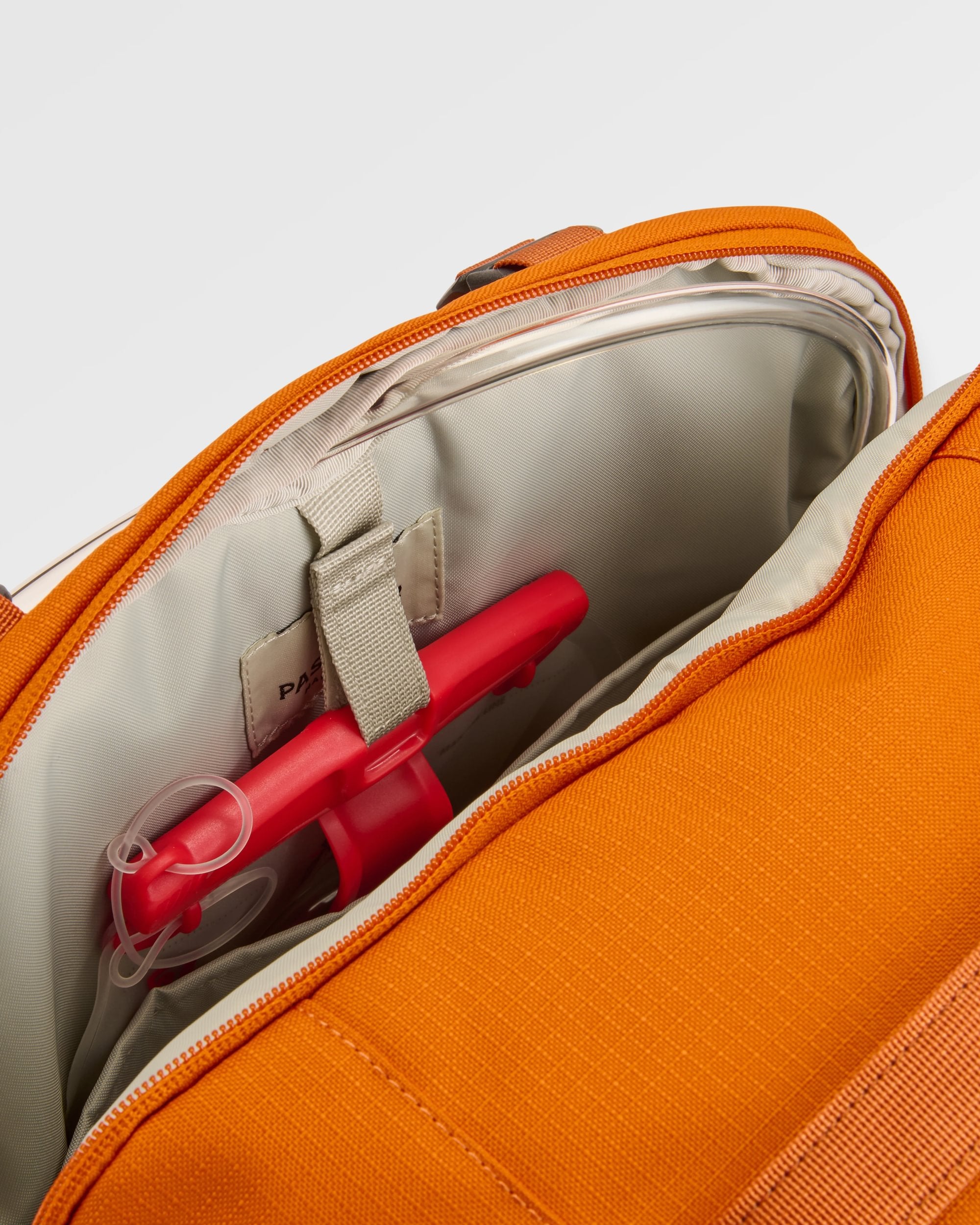 Atlas Recycled Backpack Duffel - Sunrise Orange - Flatlay